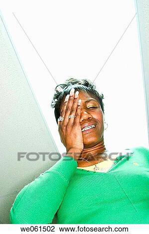 Young black woman posing View Large Photo Image Stock Image - Young black woman posing. Fotosearch