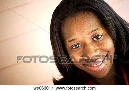 Young black woman posing View Large Photo Image Stock Photo - Young black woman posing. Fotosearch