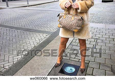 Young female fashion model wearing a fur coat. View Large Photo Image Stock Photograph - Young female fashion model wearing a fur coat.. Fotosearch