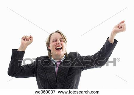 Young geeky businessman celebrating success. View Large Photo Image Stock Photo - Young geeky businessman celebrating success.. Fotosearch