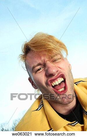 Young man posing View Large Photo Image Stock Image - Young man posing. Fotosearch