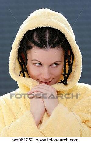 Young woman in yellow bathrobe View Large Photo Image Stock Image - Young woman in yellow bathrobe. Fotosearch