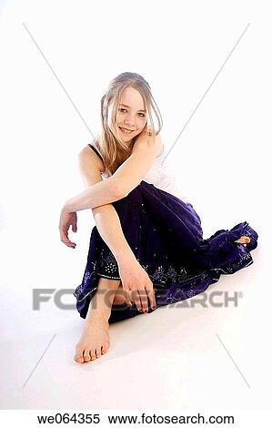 13 year old girl sitting on the studio floor, smiling shyly into camera View Large Photo Image Stock Photography - 13 year old girl sitting on the studio floor, smiling shyly into camera. Fotosearch
