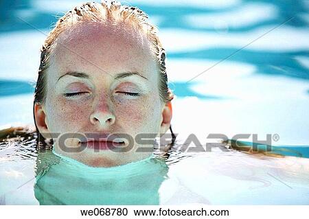 30 year old woman in swimming pool View Large Photo Image Stock Image - 30 year old woman in swimming pool. Fotosearch