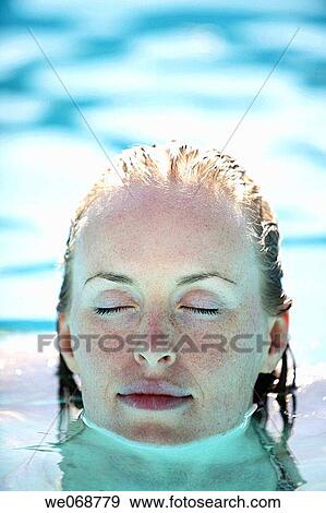 30 year old woman in swimming pool View Large Photo Image Stock Photo - 30 year old woman in swimming pool. Fotosearch