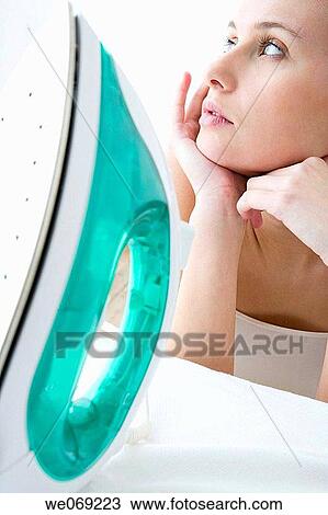 Stock Image - 30's, absorbed, absent-mindedness, Absent-minded, 20's. Fotosearch