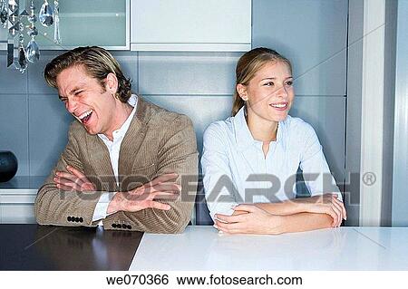 Stock Photograph - 30's, amusement, absent-mindedness, Absent-minded, 20's. Fotosearch