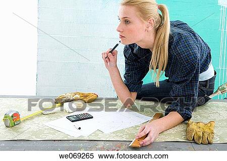 Stock Photography - 30's, brush, blond, absorbed, 20's. Fotosearch