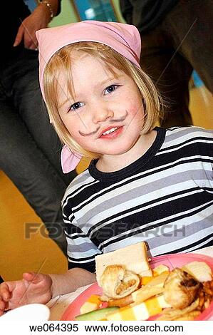 4 year old girl at a pirate party, with face paint on, eating party food View Large Photo Image Stock Photography - 4 year old girl at a pirate party, with face paint on, eating party food. Fotosearch