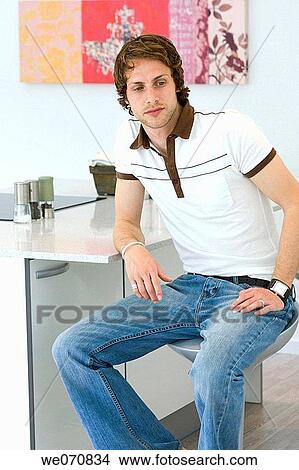 Picture - absorbed, at-home, 20's. Fotosearch