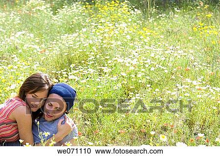 Stock Image - absorbed, bonding, bond, affection, 20's. Fotosearch