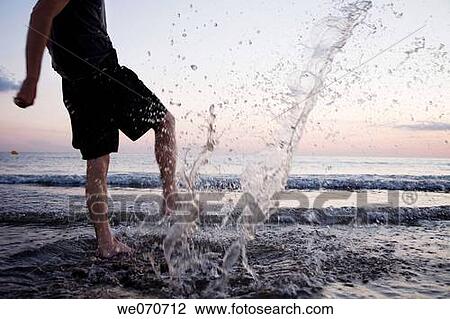 Stock Image - activity, barefoot, amusement, action. Fotosearch