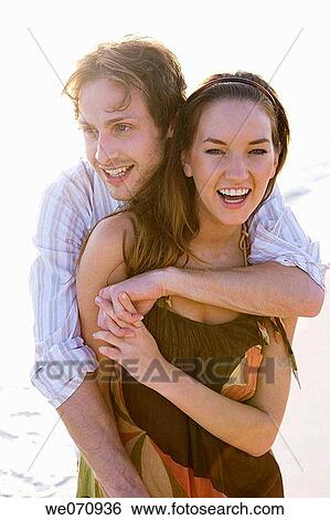 affection, beach, backlight, amusement, 20's View Large Photo Image Stock Photograph - affection, beach, backlight, amusement, 20's. Fotosearch