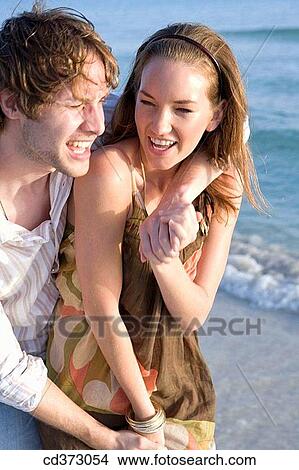 affection, bond, beach, amusement, 20's View Large Photo Image Picture - affection, bond, beach, amusement, 20's. Fotosearch