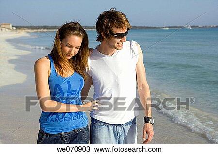 Stock Image - affection, bonding, bond, beach, 20's. Fotosearch