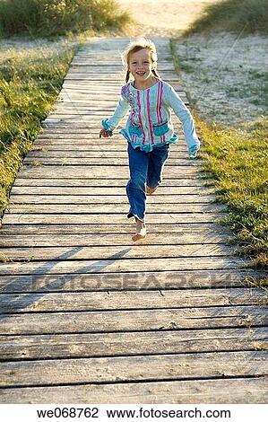 amusement, boardwalk, beach, barefoot, activity View Large Photo Image Stock Image - amusement, boardwalk, beach, barefoot, activity. Fotosearch