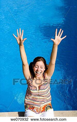 amusement, brunette, border, Arms raised, 20's View Large Photo Image Stock Image - amusement, brunette, border, Arms raised, 20's. Fotosearch