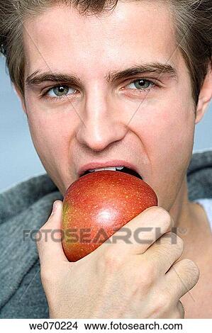 apple, blue eyes, biting, bite, adolescence View Large Photo Image Picture - apple, blue eyes, biting, bite, adolescence. Fotosearch
