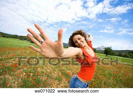 Arms open, carefree, brunette, 20's View Large Photo Image Stock Image - Arms open, carefree, brunette, 20's. Fotosearch
