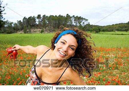 Arms open, carefree, brunette, amusement View Large Photo Image Stock Image - Arms open, carefree, brunette, amusement. Fotosearch