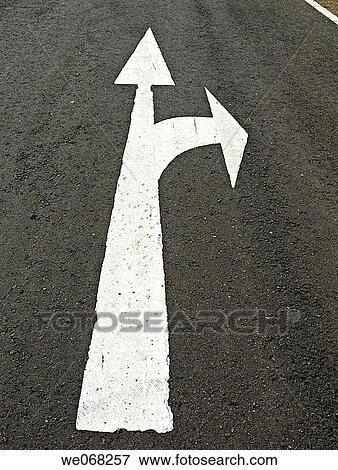 Arrows are marked on a highway for dircted the Subway. Pune, Maharashtra, India. View Large Photo Image Stock Photo - Arrows are marked on a highway for dircted the Subway. Pune, Maharashtra, India.. Fotosearch