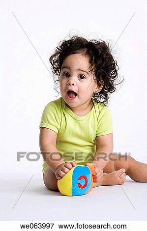 baby, ball, barefoot, Brown eye, brunette, child View Large Photo Image Stock Photo - baby, ball, barefoot, Brown eye, brunette, child. Fotosearch