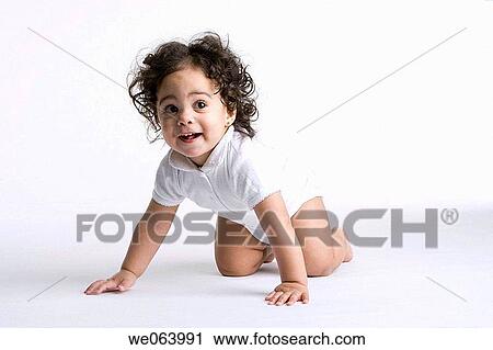 baby, barefoot, Brown eye, brunette, child, childhood View Large Photo Image Stock Image - baby, barefoot, Brown eye, brunette, child, childhood. Fotosearch