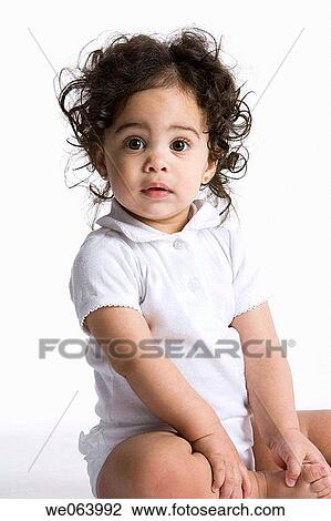 baby, barefoot, Brown eye, brunette, child, childhood View Large Photo Image Stock Image - baby, barefoot, Brown eye, brunette, child, childhood. Fotosearch