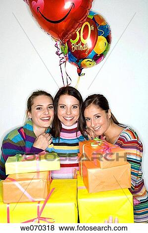 Stock Photo - balloon, Birthday party, brunette. Fotosearch