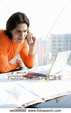 Bank card, calling, black hair, 20's View Large Photo Image Stock Photo - Bank card, calling, black hair, 20's. Fotosearch