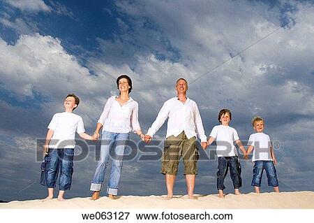 Stock Photo - barefoot, beach, boy, child. Fotosearch