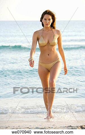 Stock Image - barefoot, beach, carnality. Fotosearch