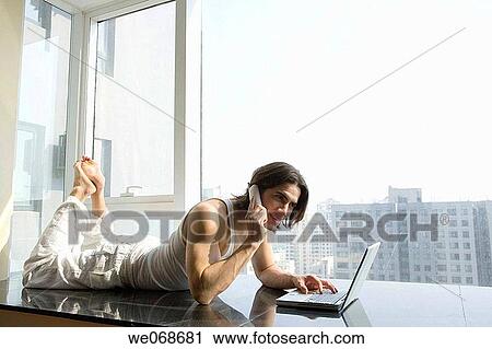 barefoot, calling, black hair, 20's View Large Photo Image Stock Image - barefoot, calling, black hair, 20's. Fotosearch