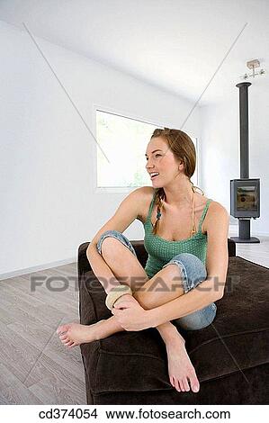 barefoot, chair, at-home View Large Photo Image Picture - barefoot, chair, at-home. Fotosearch