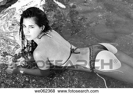 bathe, bathing, black and white, brunette View Large Photo Image Stock Photo - bathe, bathing, black and white, brunette. Fotosearch