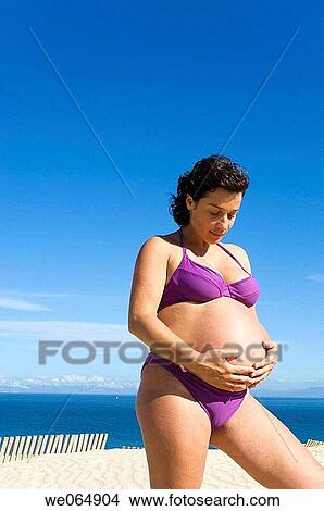 beach, belly, 30's View Large Photo Image Picture - beach, belly, 30's. Fotosearch