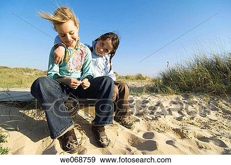 beach, child, blue sky, blue, amusement View Large Photo Image Stock Photo - beach, child, blue sky, blue, amusement. Fotosearch