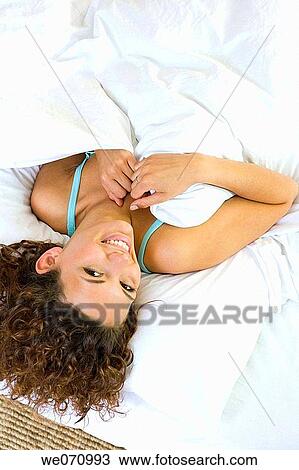 bed, bedroom, brunette, calm View Large Photo Image Stock Image - bed, bedroom, brunette, calm. Fotosearch