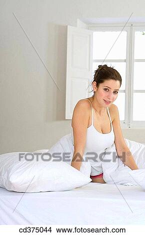 bed, brunette, bedroom, at-home View Large Photo Image Picture - bed, brunette, bedroom, at-home. Fotosearch