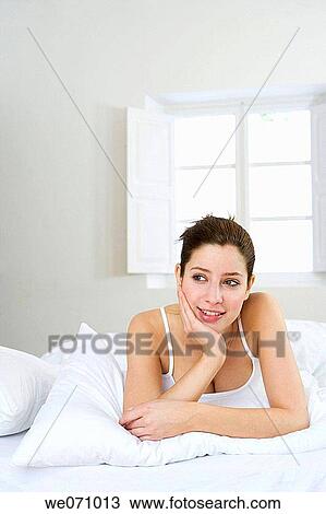 bed, calm, brunette, bedroom, absorbed View Large Photo Image Stock Image - bed, calm, brunette, bedroom, absorbed. Fotosearch