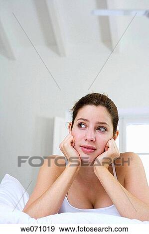 bed, calm, brunette, bedroom, absorbed View Large Photo Image Stock Photo - bed, calm, brunette, bedroom, absorbed. Fotosearch