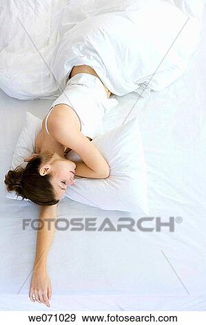 bed, calm, brunette, bedroom, absorbed View Large Photo Image Stock Photo - bed, calm, brunette, bedroom, absorbed. Fotosearch