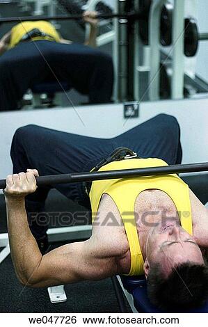 Bench press exercise, Abu Dhabi, United Arab Emirates View Large Photo Image Stock Photograph - Bench press exercise, Abu Dhabi, United Arab Emirates. Fotosearch