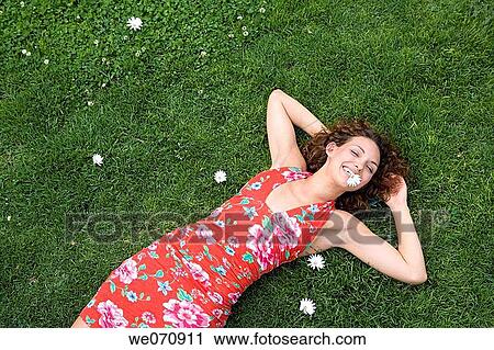 Stock Image - bite, biting, brunette, calm. Fotosearch