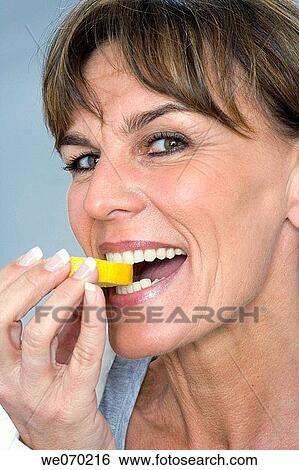 bite, Citrus fruit, biting, acid View Large Photo Image Stock Photograph - bite, Citrus fruit, biting, acid. Fotosearch