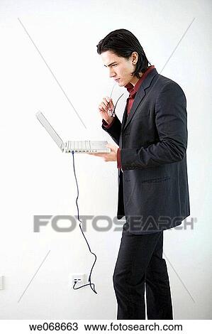black hair, cable, businesspeople, businessman, 20's View Large Photo Image Stock Image - black hair, cable, businesspeople, businessman, 20's. Fotosearch