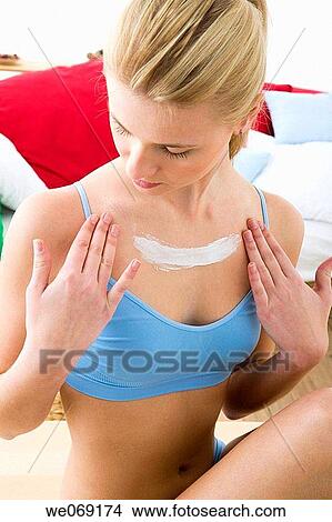 blond, chest, Body care, apply View Large Photo Image Picture - blond, chest, Body care, apply. Fotosearch