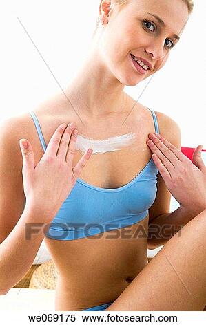 Stock Photography - blond, chest, Body care, apply. Fotosearch