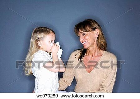 Blow nose, child, Blowing nose, affection View Large Photo Image Stock Photo - Blow nose, child, Blowing nose, affection. Fotosearch
