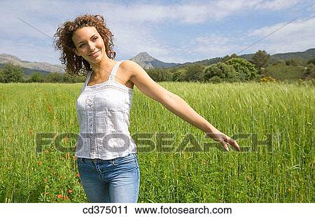 Stock Image - brunette, calm, carefree. Fotosearch